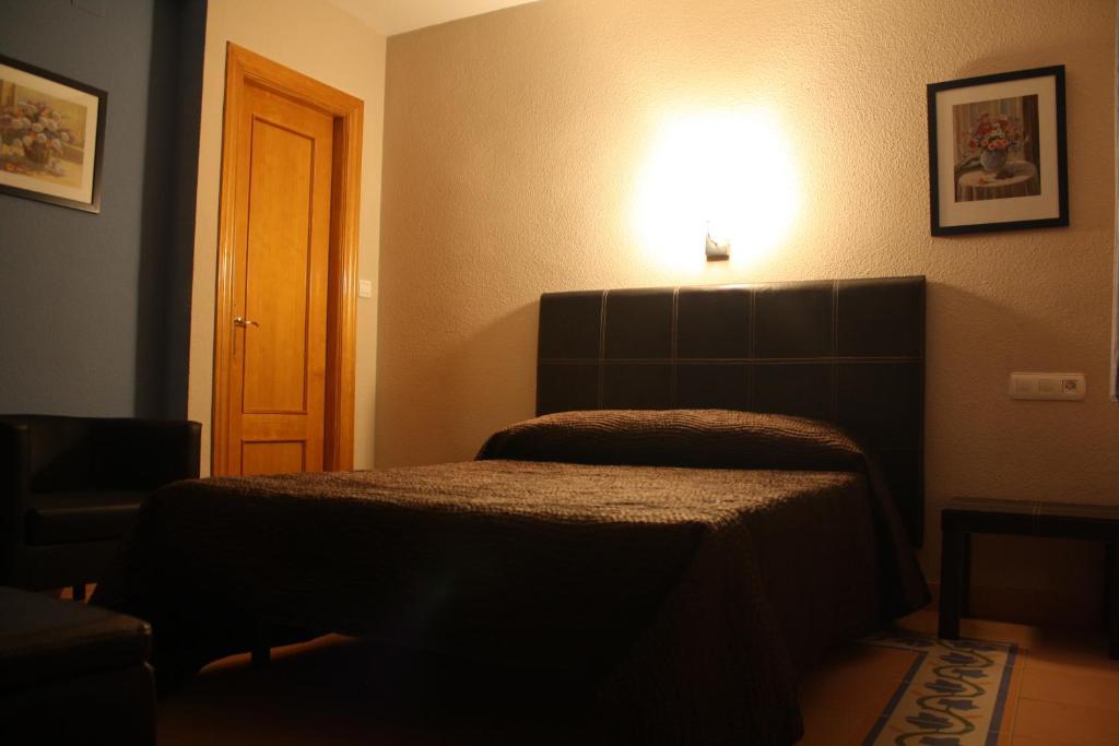 Hostal Sevilla Granada Pokoj fotografie